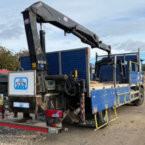 A blue HIAB Hydraulic Lorry Loader with a brick grab attachment