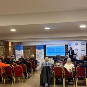 Solicitor Scott Bell presenting a talk on the role of the traffic commissioner to a room of transport professionals