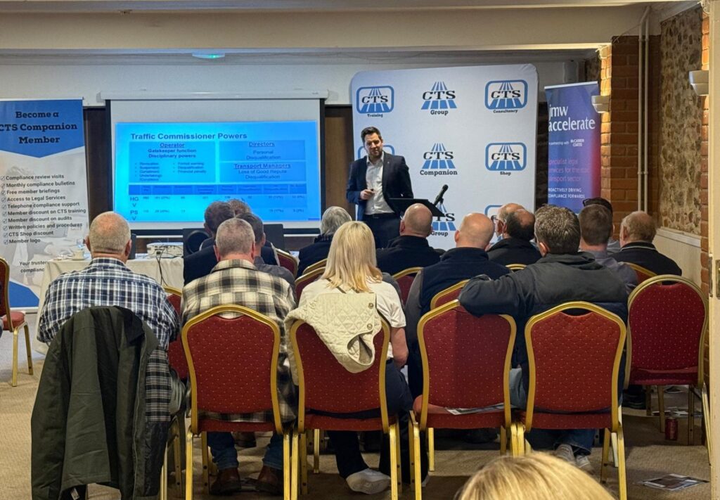 Solicitor Scott Bell presenting a talk on the role of the traffic commissioner to a room of transport professionals