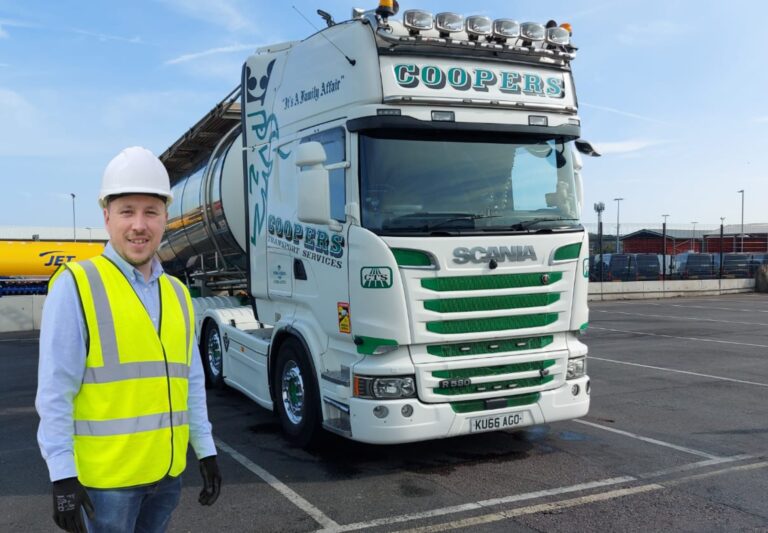 Driver Craig standing in front of his lorry.