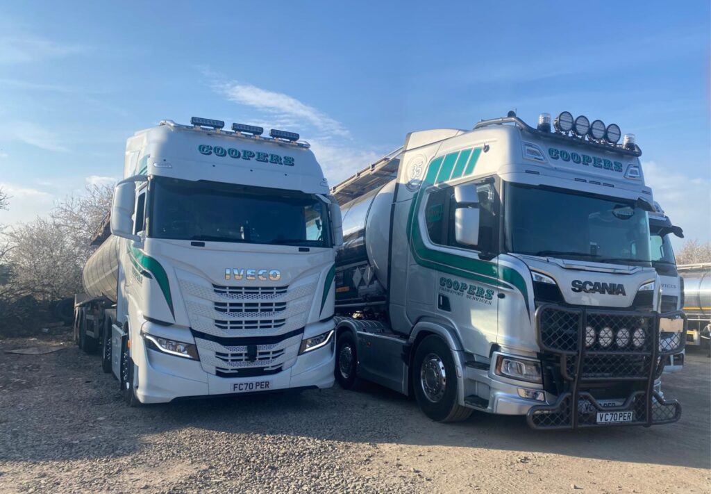 Two lorries parked next to each other.